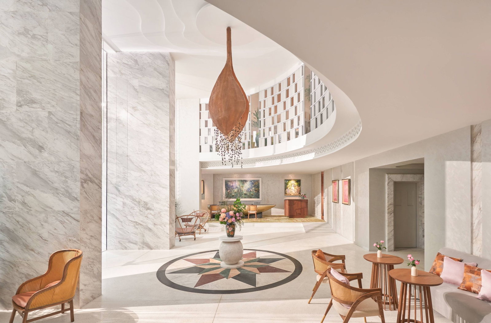 The lobby at Silverland Mây, centred on a hanging kapok flower installation