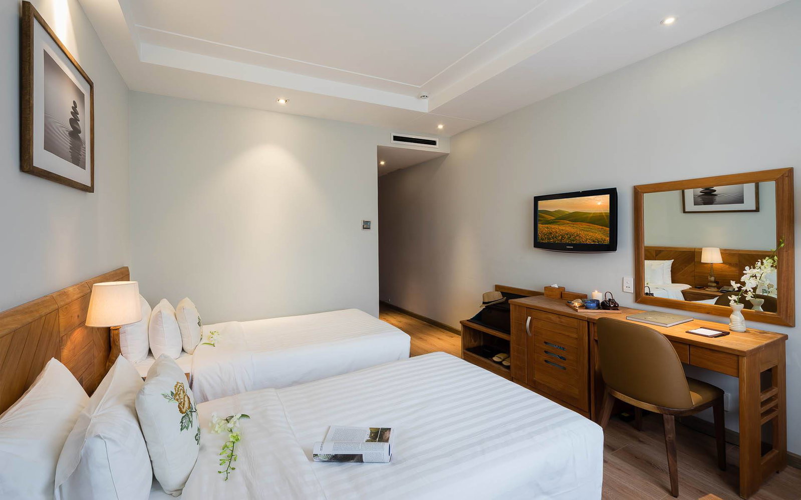 Premier room at Silverland Yen with a city view and a quiet, wood-toned interior