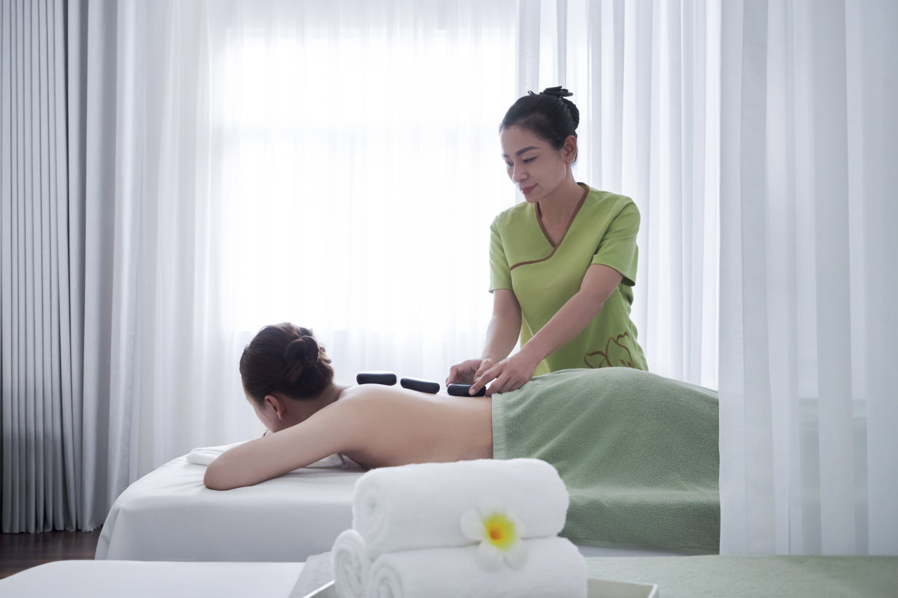From KL Spa to Rooftop Onsen Jacuzzi: A Wellness Stay at Silverland Sil 2 Hot stone massage at KL Spa, part of the Silverland Sil wellness floor in Japan Town, Ho Chi Minh City