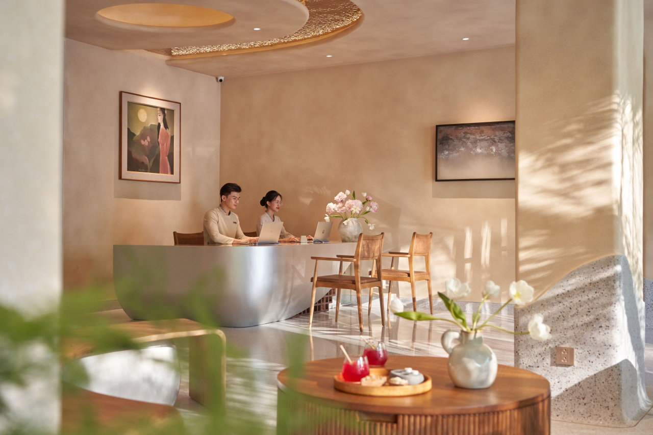 From Meetings to Wellness: A Business Traveller's Stay at Silverland Sil 2 Reception desk at Silverland Sil, a business hotel on Thai Van Lung Street in Ho Chi Minh City