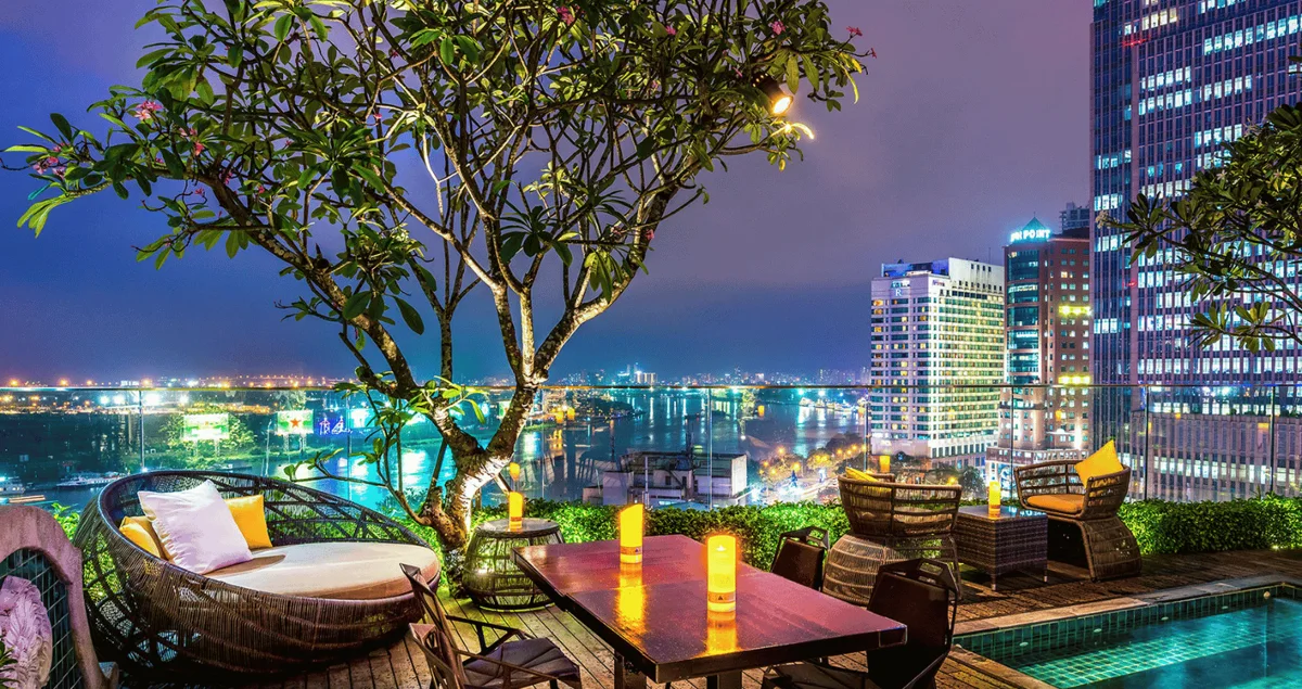 Evening seating at JOLIE ROOFTOP GARDEN BAR during a Silverland Jolie riverside stay