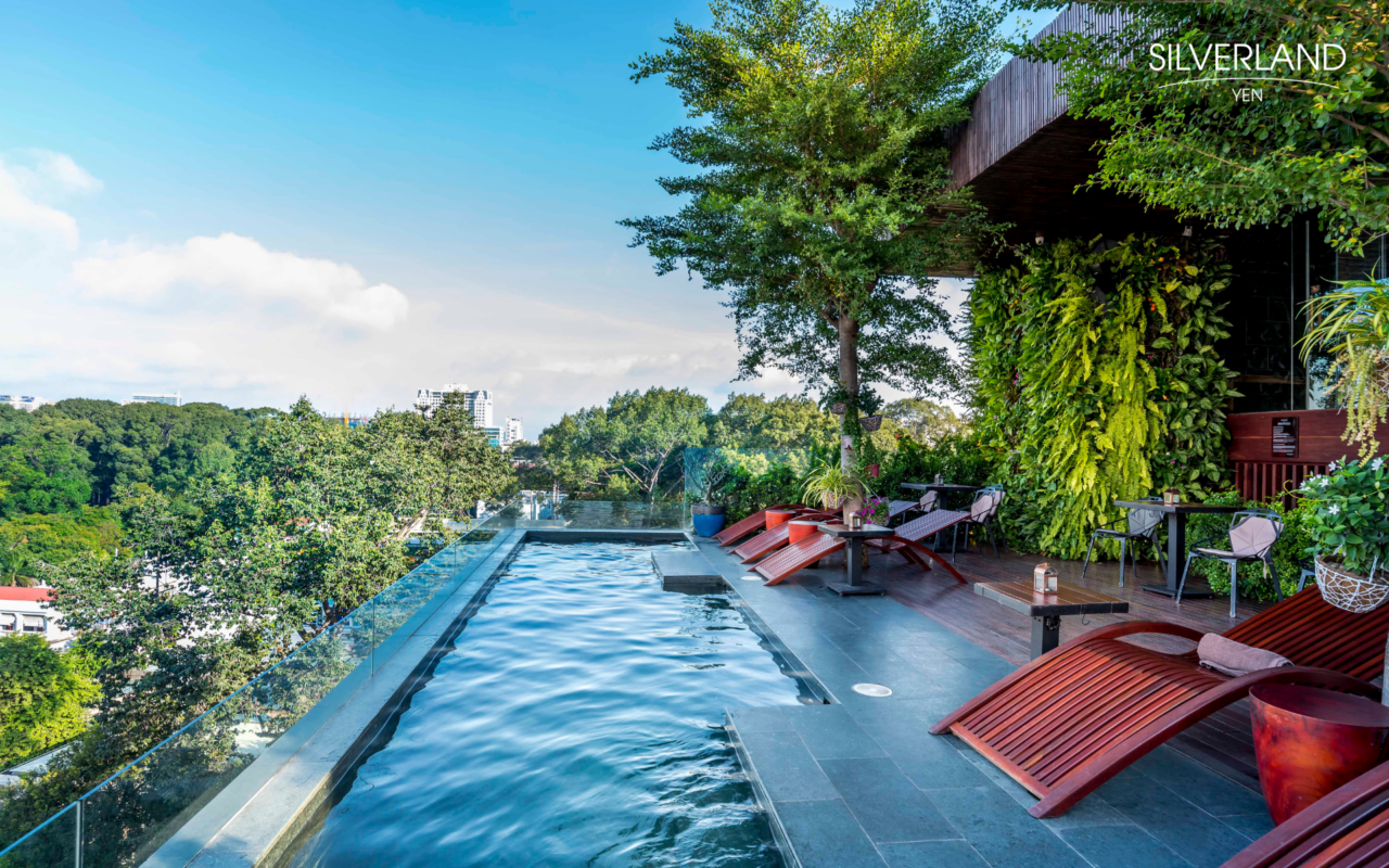 Silverland Yen Recognised Loved by Guests 2026 award by Expedia Group 2 Rooftop pool at Silverland Yen Hotel overlooking greenery near Independence Palace, Saigon